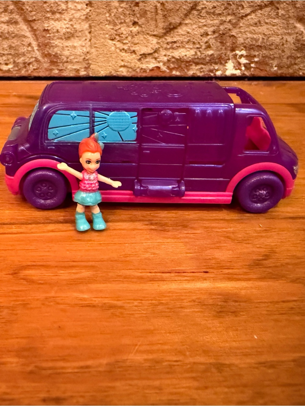 Polly Pocket Pollyville Party Limo vehicle with a Lila doll